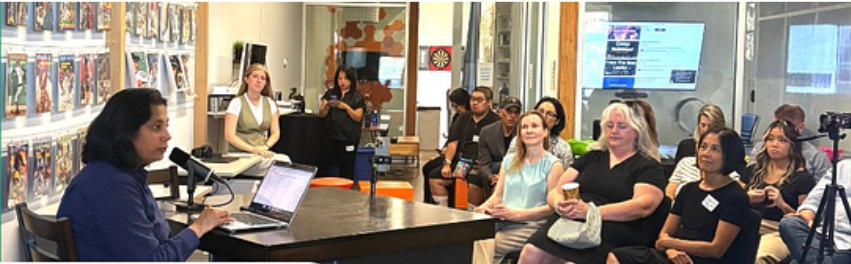 Lakshmi Peri presenting the agentic launch readiness system at EM Marketing's AI in Practice panel, Redwood City, July 2026